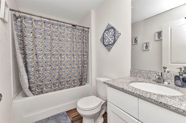 3799 Laredo Ave, North Port, FL 34288 - bathroom featuring vanity, shower / bath combo with shower curtain, toilet, and wood finished floors