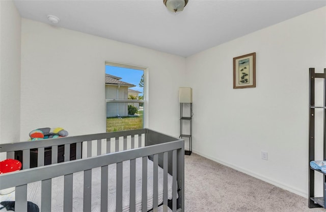 3799 Laredo Ave, North Port, FL 34288 - bedroom with carpet, baseboards, and a crib
