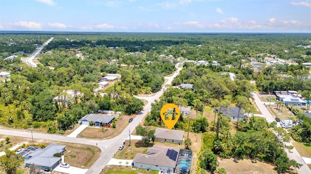 3799 Laredo Ave, North Port, FL 34288 - aerial perspective of suburban area with a forest
