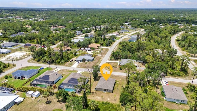 3799 Laredo Ave, North Port, FL 34288 - aerial view of property's location with nearby suburban area and a forest