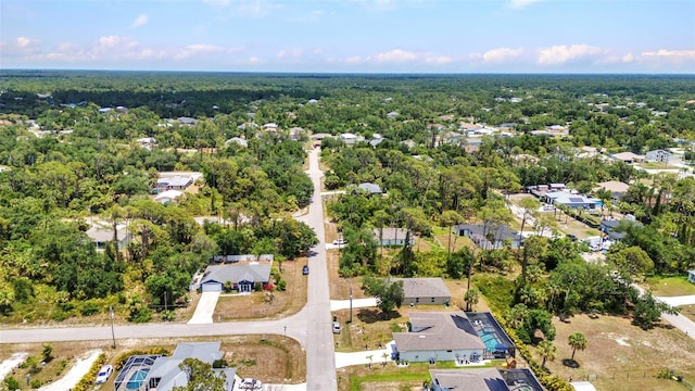 3799 Laredo Ave, North Port, FL 34288 - aerial perspective of suburban area featuring a heavily wooded area