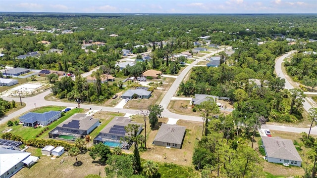 3799 Laredo Ave, North Port, FL 34288 - aerial view of property's location featuring nearby suburban area and a forest