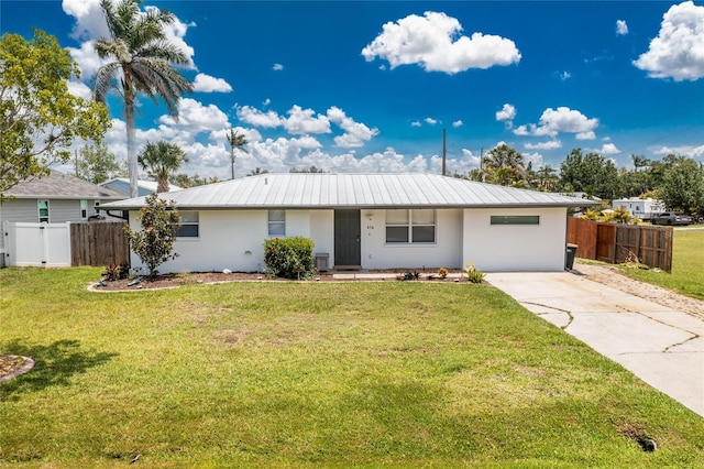 416 Allen St, Punta Gorda, FL 33950 - ranch-style home featuring stucco siding, metal roof, and driveway