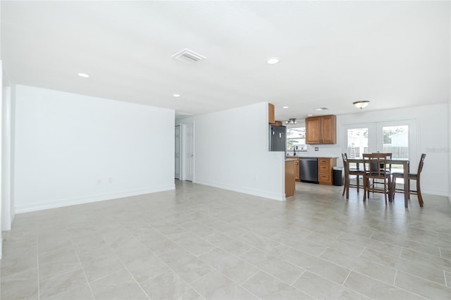 416 Allen St, Punta Gorda, FL 33950 - living room featuring baseboards and recessed lighting