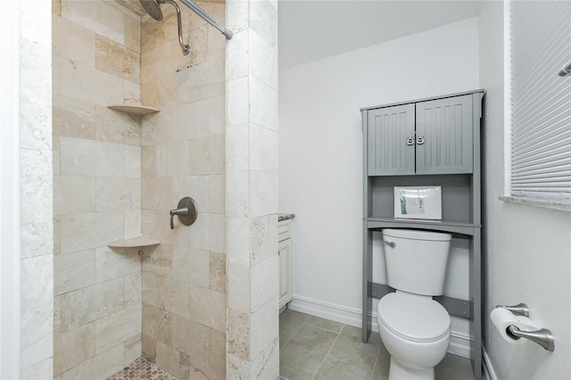 416 Allen St, Punta Gorda, FL 33950 - bathroom featuring tiled shower, toilet, and baseboards
