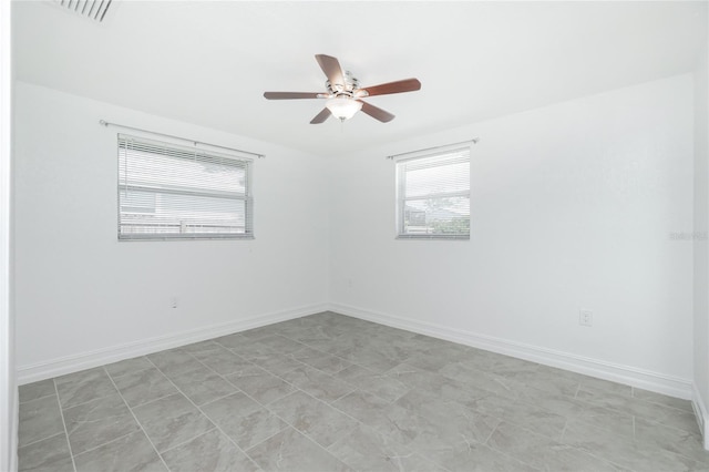 416 Allen St, Punta Gorda, FL 33950 - spare room with a ceiling fan and baseboards