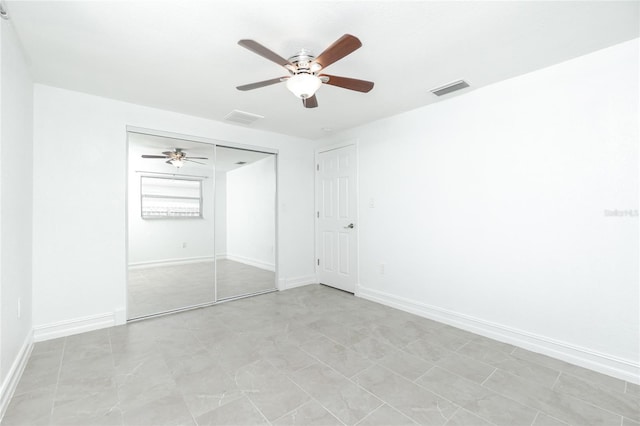 416 Allen St, Punta Gorda, FL 33950 - unfurnished bedroom featuring baseboards, ceiling fan, and a closet