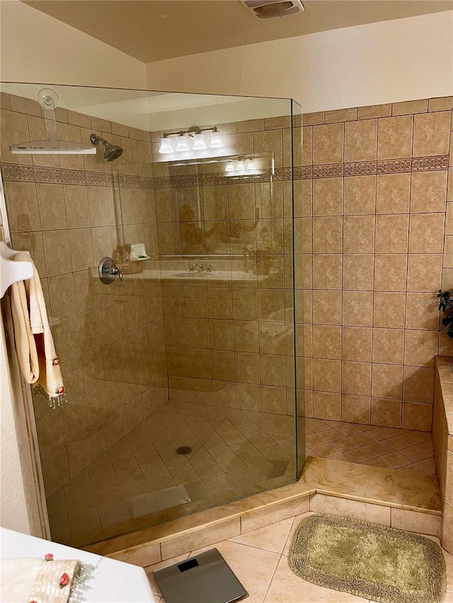 96 Vivante Blvd Unit 9622, Punta Gorda, FL 33950 - bathroom featuring walk in shower and tile patterned flooring