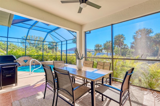 122 Arrow Ln, Rotonda West, FL 33947 - sunroom with a ceiling fan and outdoor dining space