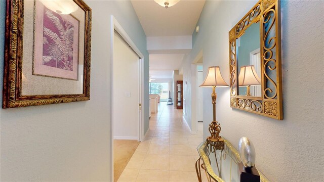 2002 Bal Harbor Blvd Unit 1712, Punta Gorda, FL 33950 - hall featuring light tile patterned flooring and baseboards