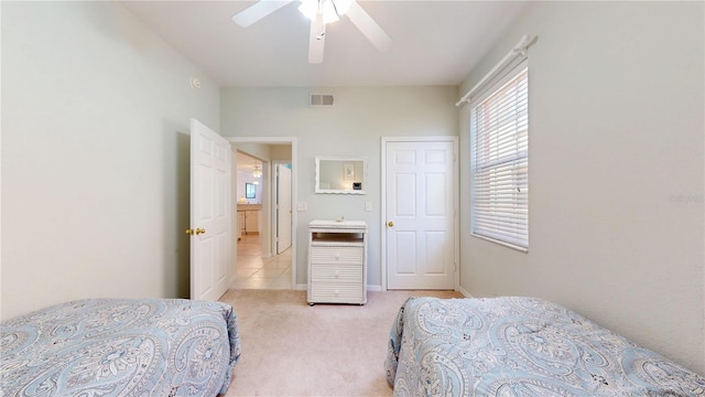 2002 Bal Harbor Blvd Unit 1712, Punta Gorda, FL 33950 - bedroom with light carpet and ceiling fan