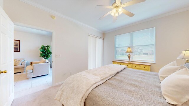2002 Bal Harbor Blvd Unit 1712, Punta Gorda, FL 33950 - bedroom with ornamental molding, light carpet, baseboards, a ceiling fan, and a closet