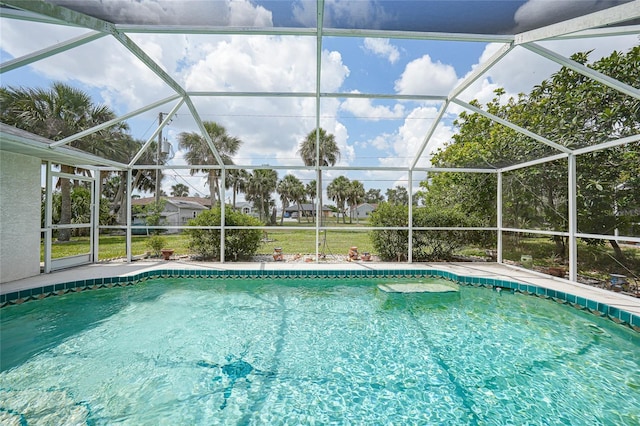 4055 Alwick Ln, North Port, FL 34287 - outdoor pool with glass enclosure and a patio area