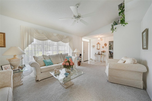 4055 Alwick Ln, North Port, FL 34287 - carpeted living area featuring vaulted ceiling and a ceiling fan