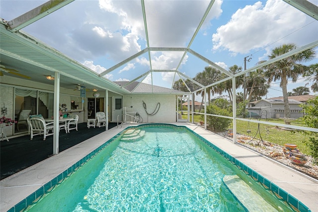 4055 Alwick Ln, North Port, FL 34287 - outdoor pool featuring a ceiling fan, a patio area, and a lanai