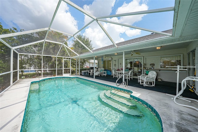 4055 Alwick Ln, North Port, FL 34287 - swimming pool featuring a patio, ceiling fan, and glass enclosure