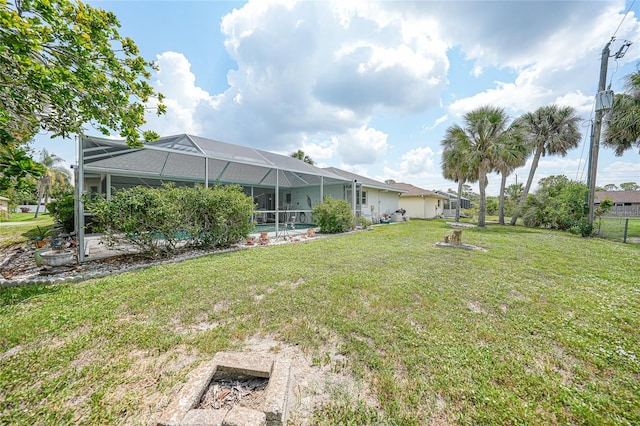 4055 Alwick Ln, North Port, FL 34287 - view of grassy yard with a lanai