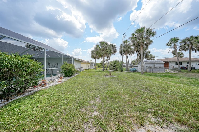 4055 Alwick Ln, North Port, FL 34287 - view of grassy yard with glass enclosure