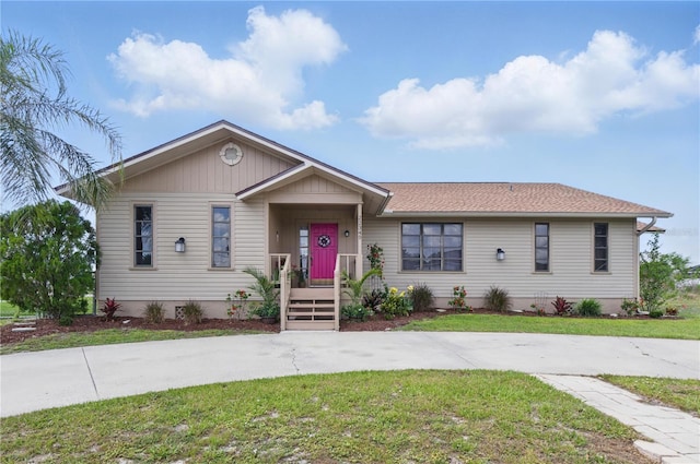 22349 Columbus Ave, Port Charlotte, FL 33954 - view of front of property with a front yard