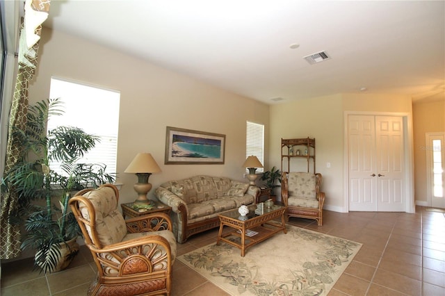 13256 Creekside Ln, Port Charlotte, FL 33953 - living area featuring tile patterned floors and plenty of natural light