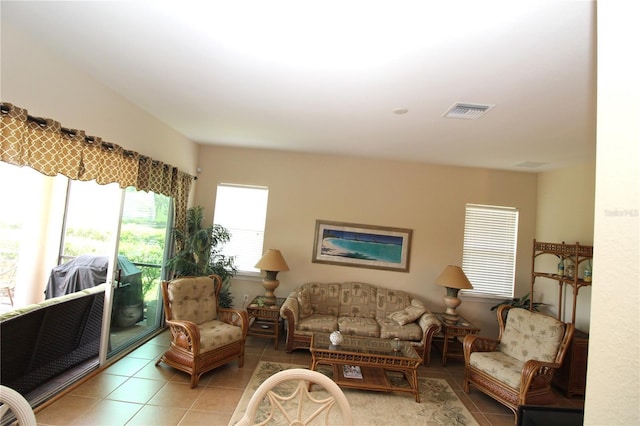 13256 Creekside Ln, Port Charlotte, FL 33953 - living area featuring light tile patterned floors