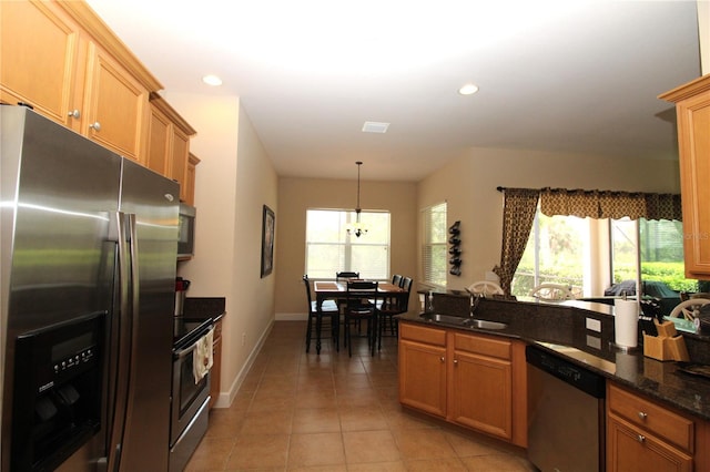 13256 Creekside Ln, Port Charlotte, FL 33953 - kitchen with stainless steel appliances, a sink, light tile patterned floors, baseboards, and recessed lighting