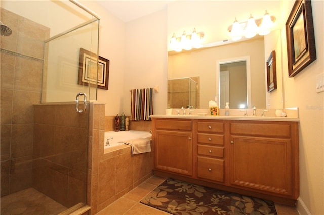 13256 Creekside Ln, Port Charlotte, FL 33953 - bathroom with a stall shower, double vanity, a garden tub, and tile patterned floors