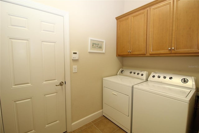 13256 Creekside Ln, Port Charlotte, FL 33953 - laundry room with cabinet space, separate washer and dryer, baseboards, and light tile patterned floors