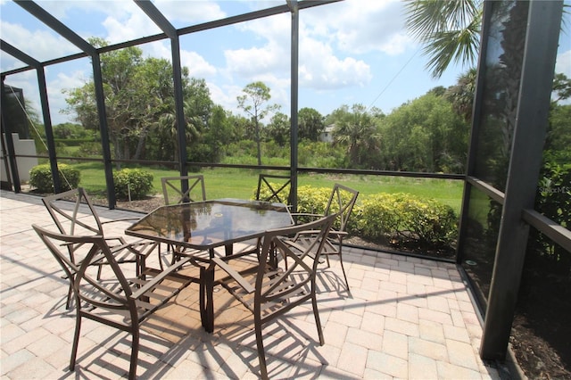 13256 Creekside Ln, Port Charlotte, FL 33953 - sunroom featuring outdoor dining space