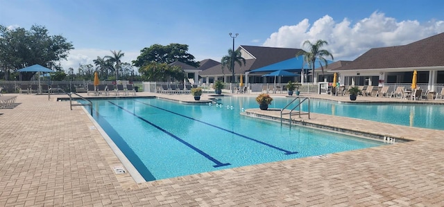13256 Creekside Ln, Port Charlotte, FL 33953 - community pool featuring a patio area