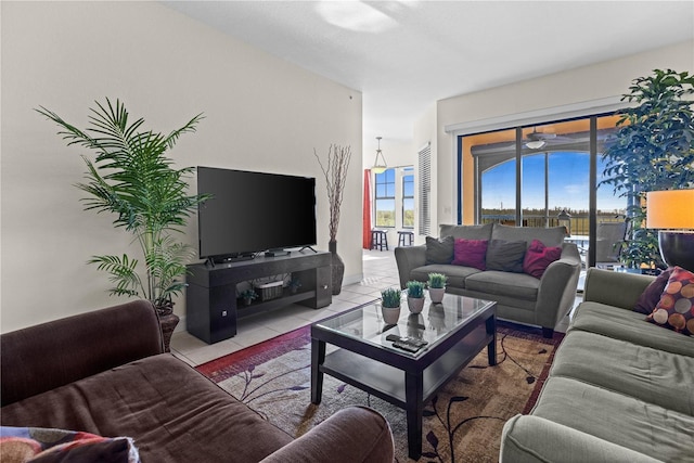 99 Vivante Blvd Unit 303, Punta Gorda, FL 33950 - living area featuring tile patterned floors and a ceiling fan