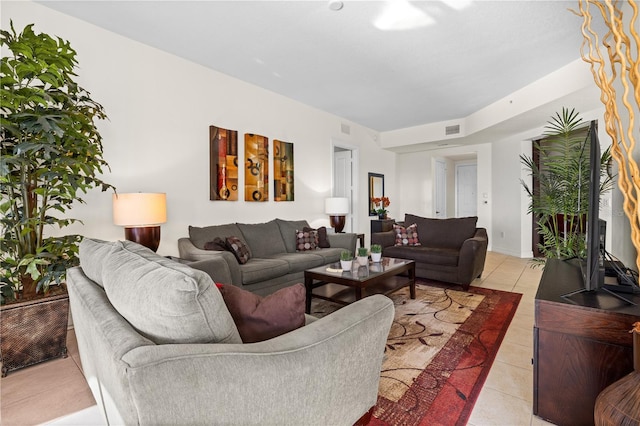 99 Vivante Blvd Unit 303, Punta Gorda, FL 33950 - living room featuring light tile patterned floors