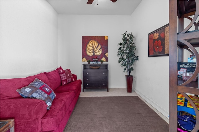99 Vivante Blvd Unit 303, Punta Gorda, FL 33950 - tiled living room with ceiling fan and carpet flooring