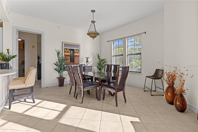 99 Vivante Blvd Unit 303, Punta Gorda, FL 33950 - dining room with light tile patterned floors and baseboards