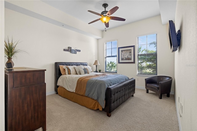 99 Vivante Blvd Unit 303, Punta Gorda, FL 33950 - bedroom with light carpet, baseboards, and a ceiling fan
