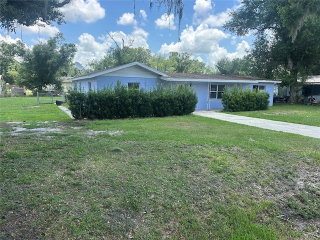 708 N Johnson Ave, Arcadia, FL 34266 - ranch-style house with a front yard