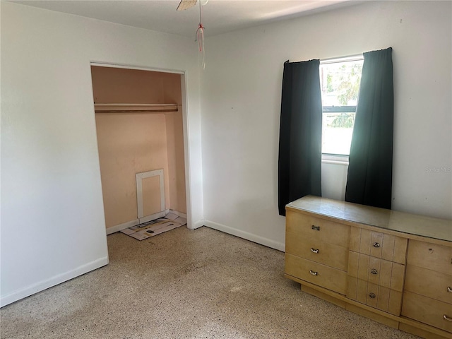 708 N Johnson Ave, Arcadia, FL 34266 - unfurnished bedroom featuring speckled floor and baseboards