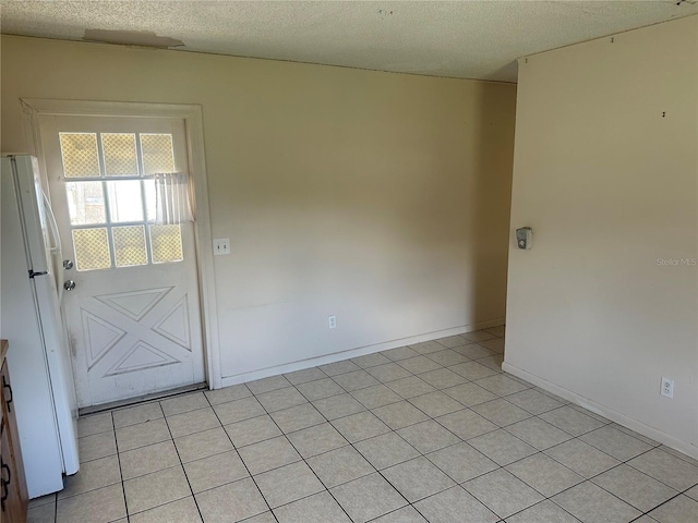 708 N Johnson Ave, Arcadia, FL 34266 - unfurnished room featuring a textured ceiling and baseboards
