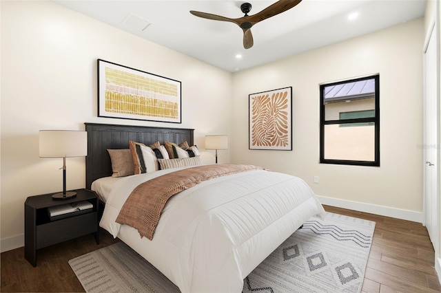 3413 NW 9th Ter, Cape Coral, FL 33904 - bedroom with wood finished floors, baseboards, recessed lighting, and ceiling fan