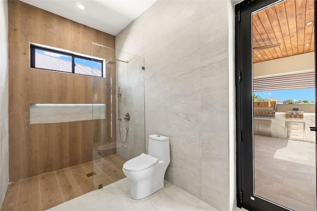 3413 NW 9th Ter, Cape Coral, FL 33904 - full bath featuring walk in shower, toilet, healthy amount of natural light, and tile walls