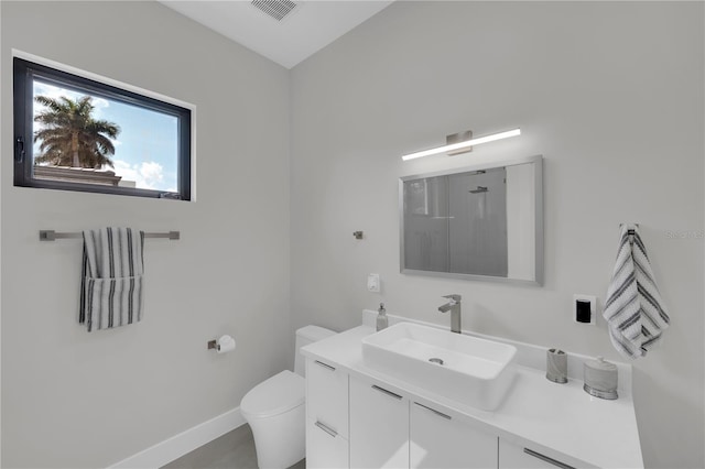1324 Longwood Dr, Fort Myers, FL 33919 - bathroom featuring vanity, toilet, and baseboards