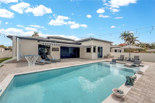 1324 Longwood Dr, Fort Myers, FL 33919 - back of property with a patio and stucco siding