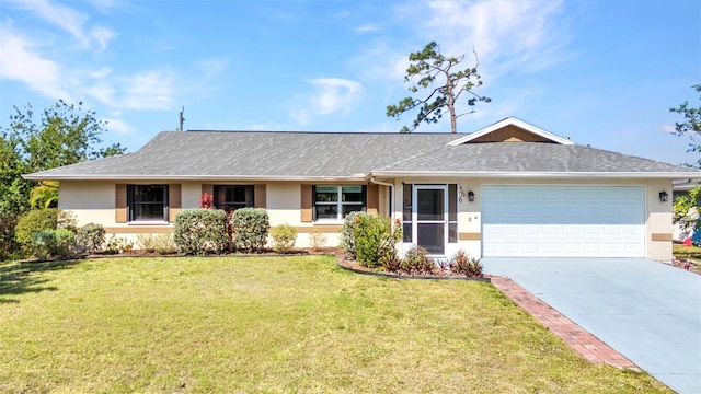 566 Reading St NW, Port Charlotte, FL 33952 - single story home with stucco siding, an attached garage, concrete driveway, a front yard, and a shingled roof