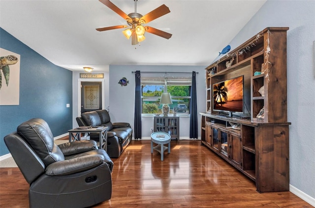 566 Reading St NW, Port Charlotte, FL 33952 - living area with wood finished floors, a ceiling fan, and baseboards