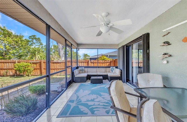 566 Reading St NW, Port Charlotte, FL 33952 - sunroom featuring an outdoor living space and ceiling fan