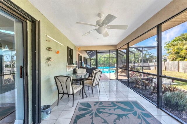 566 Reading St NW, Port Charlotte, FL 33952 - sunroom / solarium featuring a ceiling fan