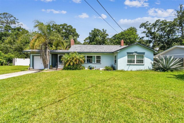 4707 Southgate Dr, Jacksonville, FL 32207 - ranch-style home featuring an attached garage, driveway, and a chimney