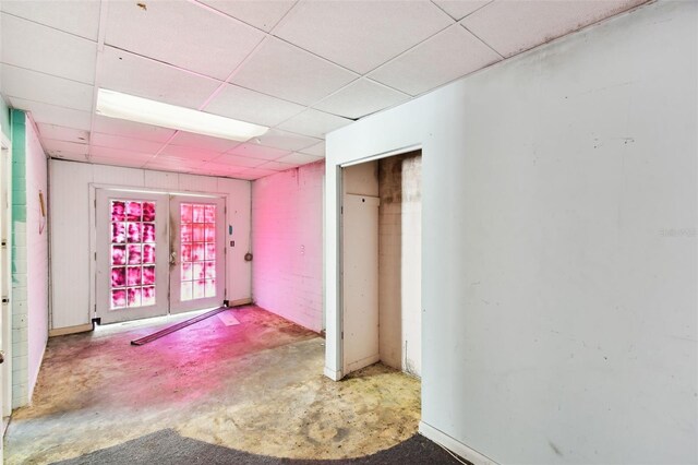 4707 Southgate Dr, Jacksonville, FL 32207 - hall featuring a drop ceiling and unfinished concrete flooring
