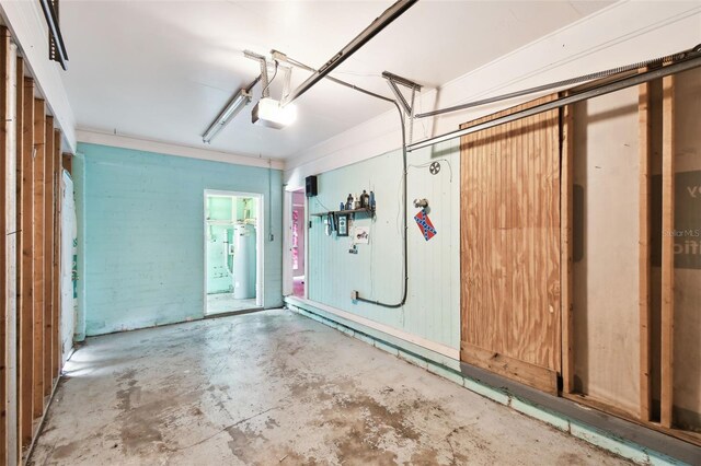 4707 Southgate Dr, Jacksonville, FL 32207 - garage with gas water heater and a garage door opener