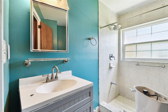 4707 Southgate Dr, Jacksonville, FL 32207 - bathroom featuring a tile shower and vanity